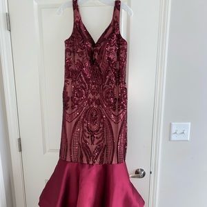it’s a beautiful burgundy/red prom dress